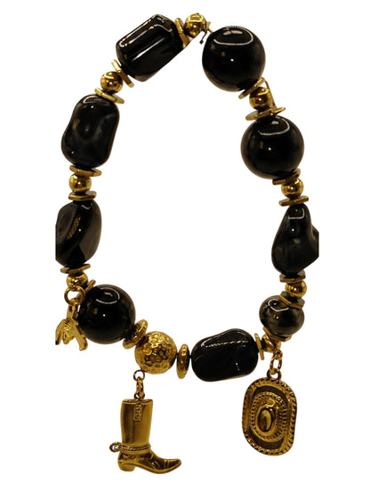 Bracelet charms "Taylor Western" noir et doré en acier inoxydable signé MILE MILA