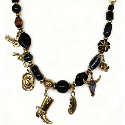 Collier Taylor Far West de chez MILE MILA noir et or en acier inoxydable