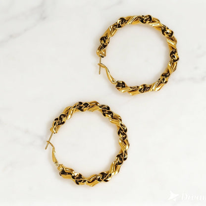 Créoles torsadées "Taylor Western"  en acier inoxydable signé MILE MILA