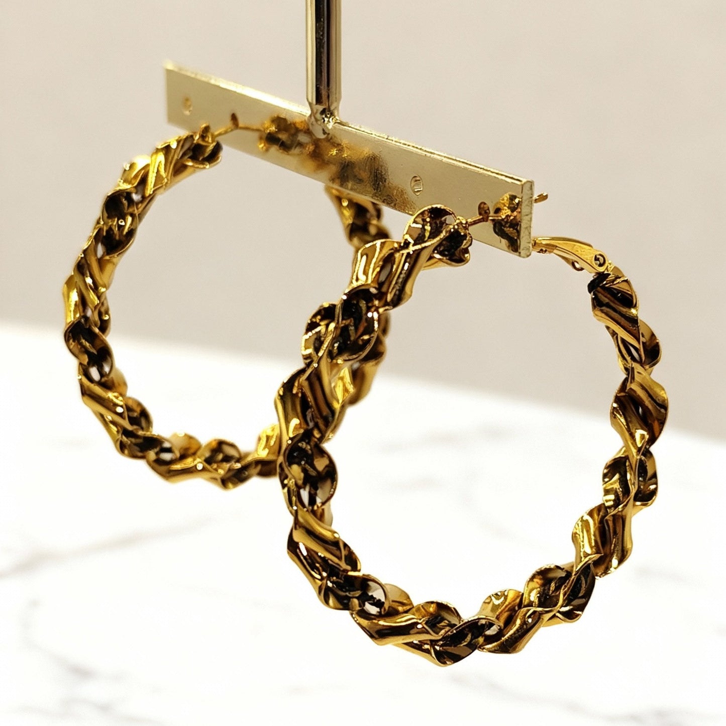 Créoles torsadées "Taylor Western"  en acier inoxydable signé MILE MILA