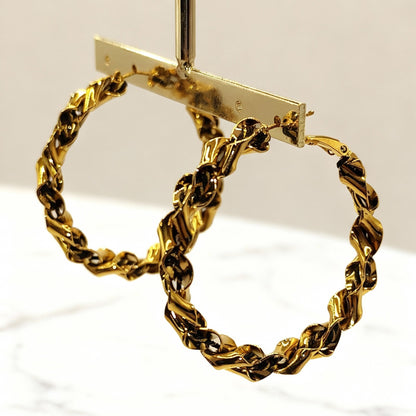 Créoles torsadées "Taylor Western"  en acier inoxydable signé MILE MILA